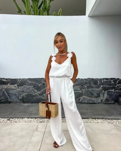 NOMI™ - Ærmeløs jumpsuit med vidde ben